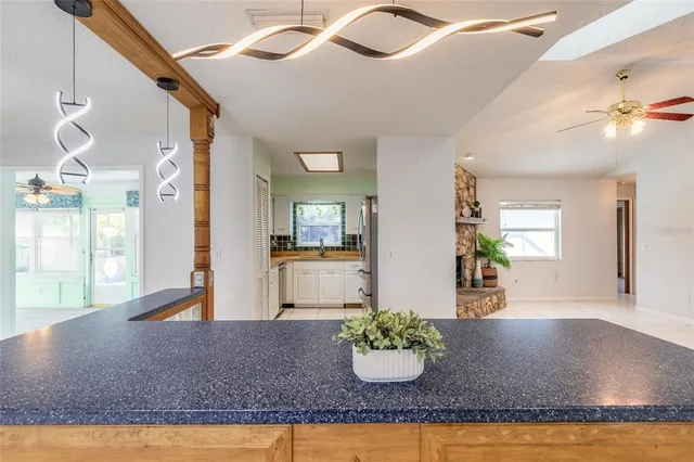 a view of a living room and bathroom