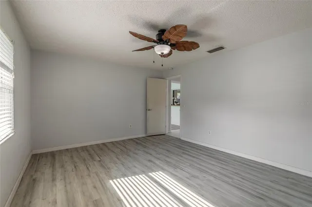 a view of an empty walk in closet