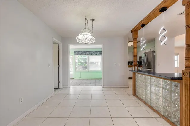 a view of an entryway with chandelier