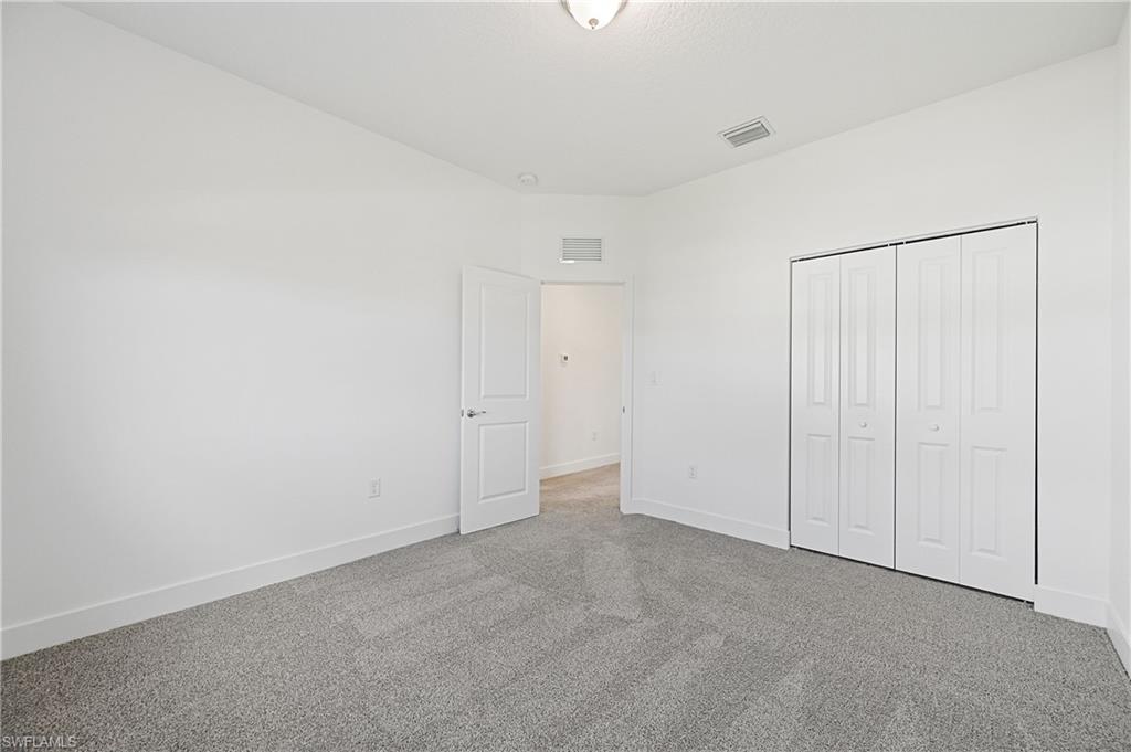 5617 Cobalto Way Avenue Immokalee, FL 34142 - Photo 20 of 35 a view of an empty room