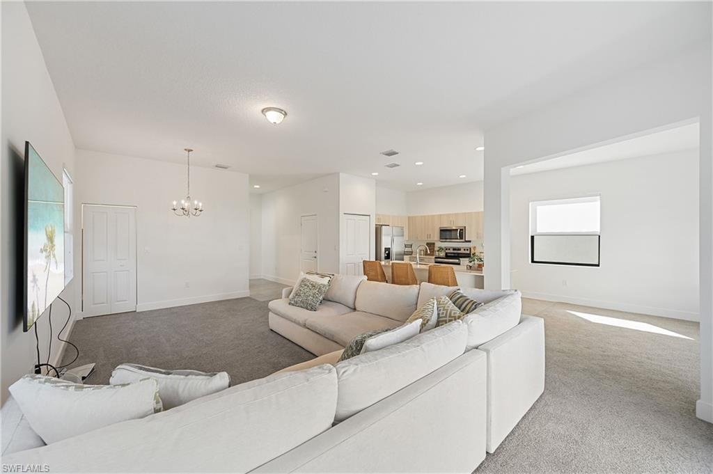 5617 Cobalto Way Avenue Immokalee, FL 34142 - Photo 26 of 35 a living room with furniture