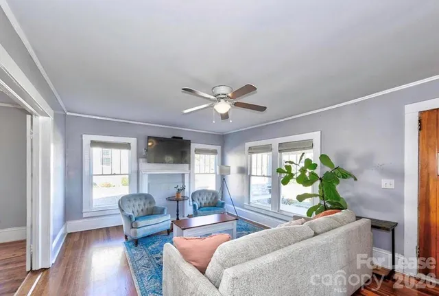a living room with furniture and a window