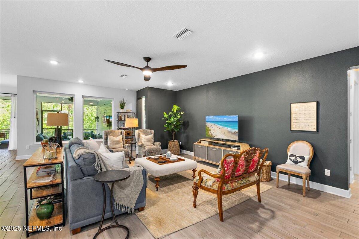 169 Rivercliff Trail St. Augustine, FL 32092 - Photo 11 of 49 a living room with furniture and wooden floor