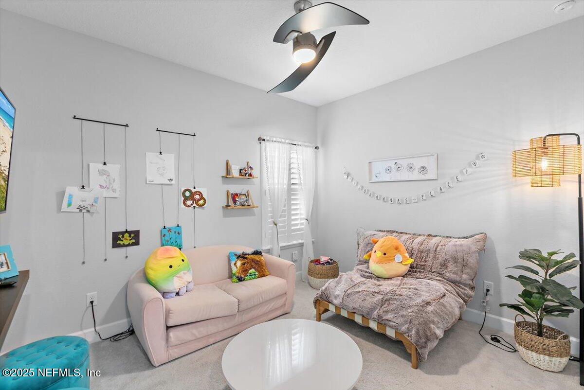 169 Rivercliff Trail St. Augustine, FL 32092 - Photo 25 of 49 a living room with furniture and a couch