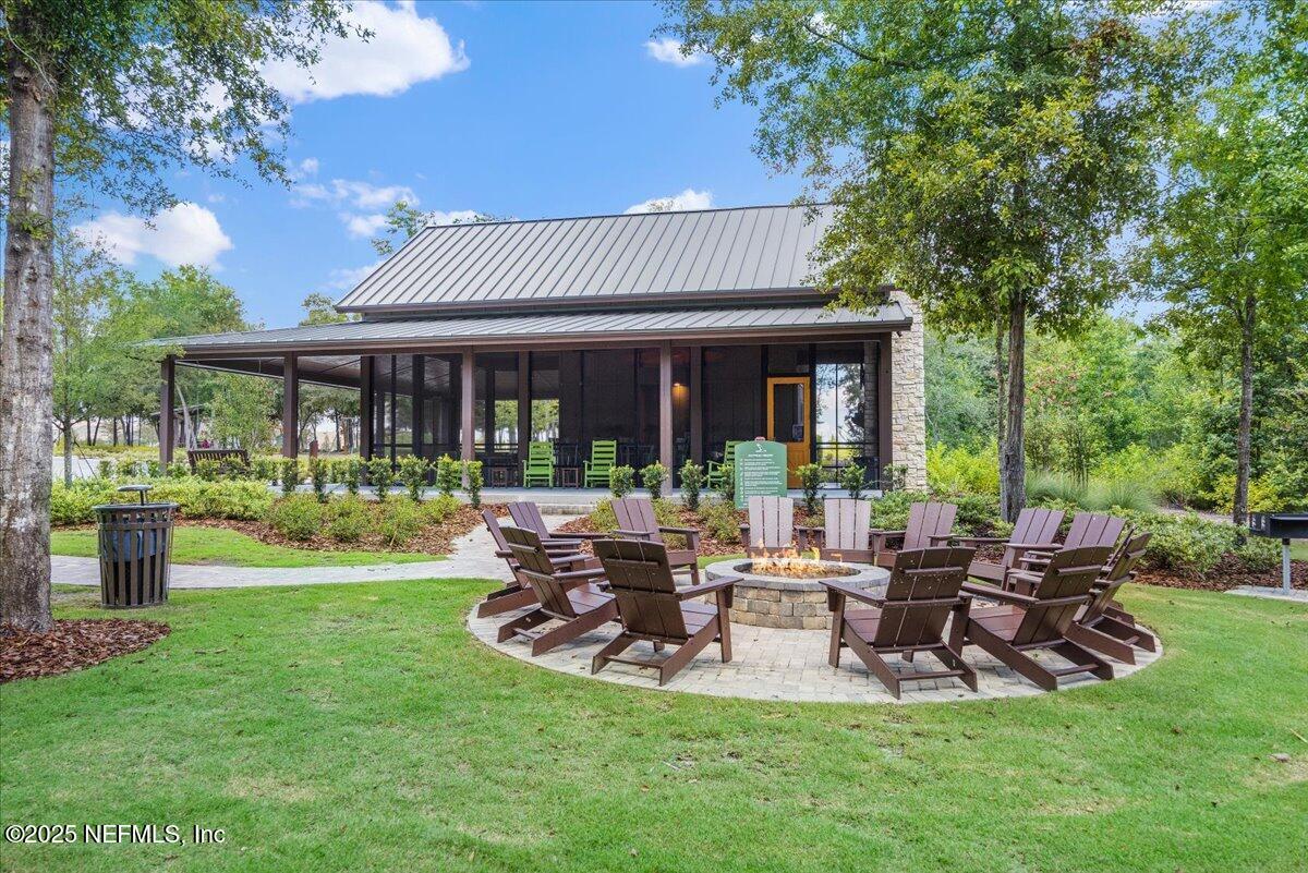 169 Rivercliff Trail St. Augustine, FL 32092 - Photo 47 of 49 a view of a house with backyard porch and sitting area