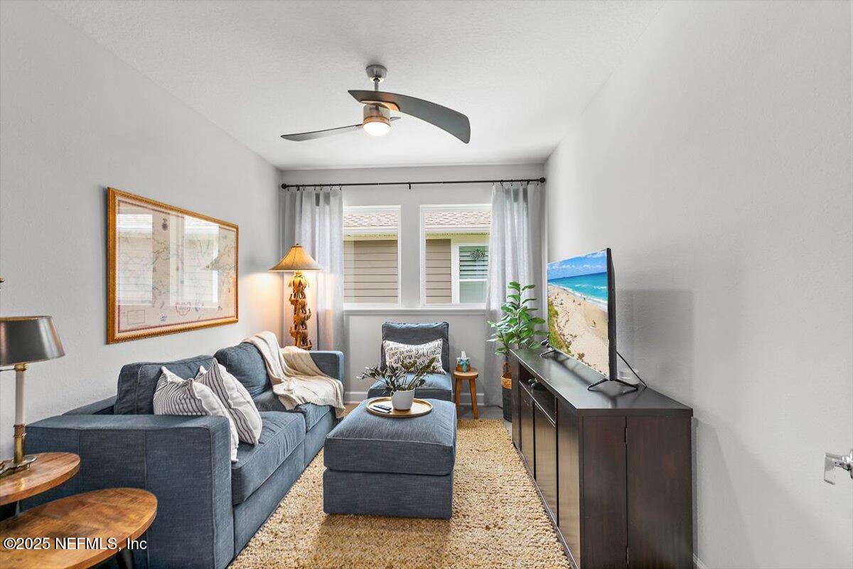 169 Rivercliff Trail St. Augustine, FL 32092 - Photo 10 of 49 a living room with furniture and a window