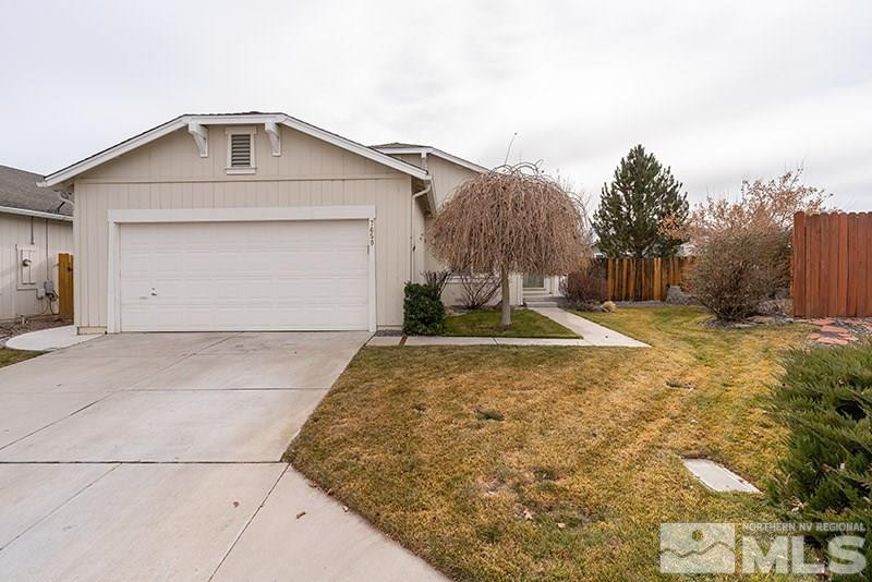 7650 Bichon Street Reno, NV 89506 - Photo 15 of 15 a front view of a house with a yard