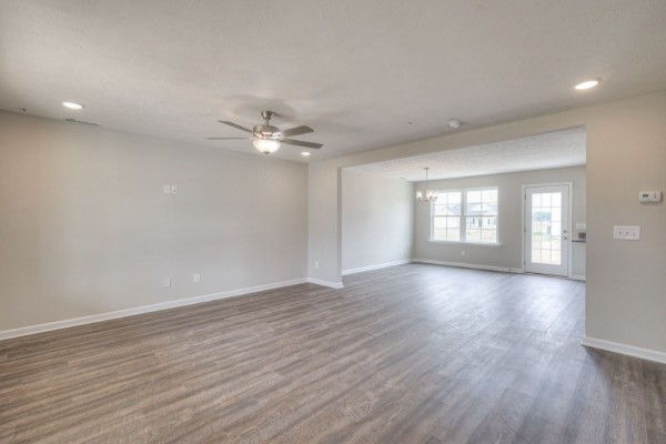 6 Laurel View Street Manchester, TN 37355 - Photo 7 of 11 a view of an empty room with a window and wooden floor