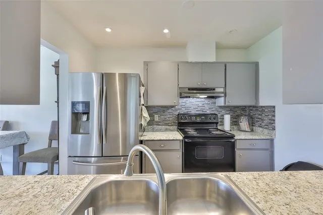 a view of a golf course with a lake