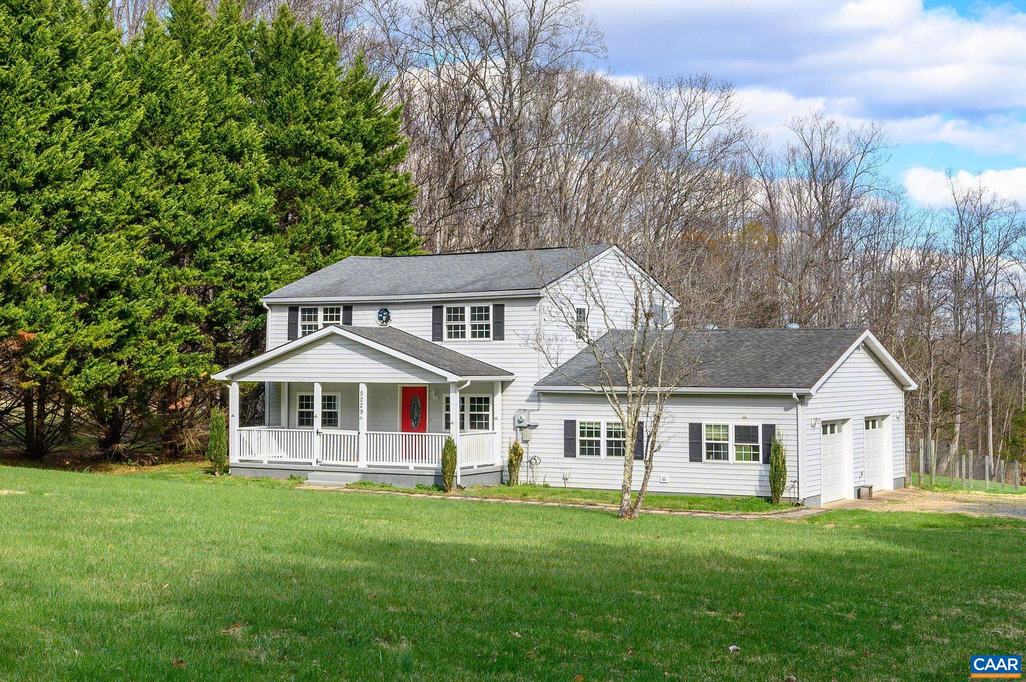 5029 Green Creek Road Schuyler, VA 22969 - Photo 1 of 27 a front view of a house with a yard