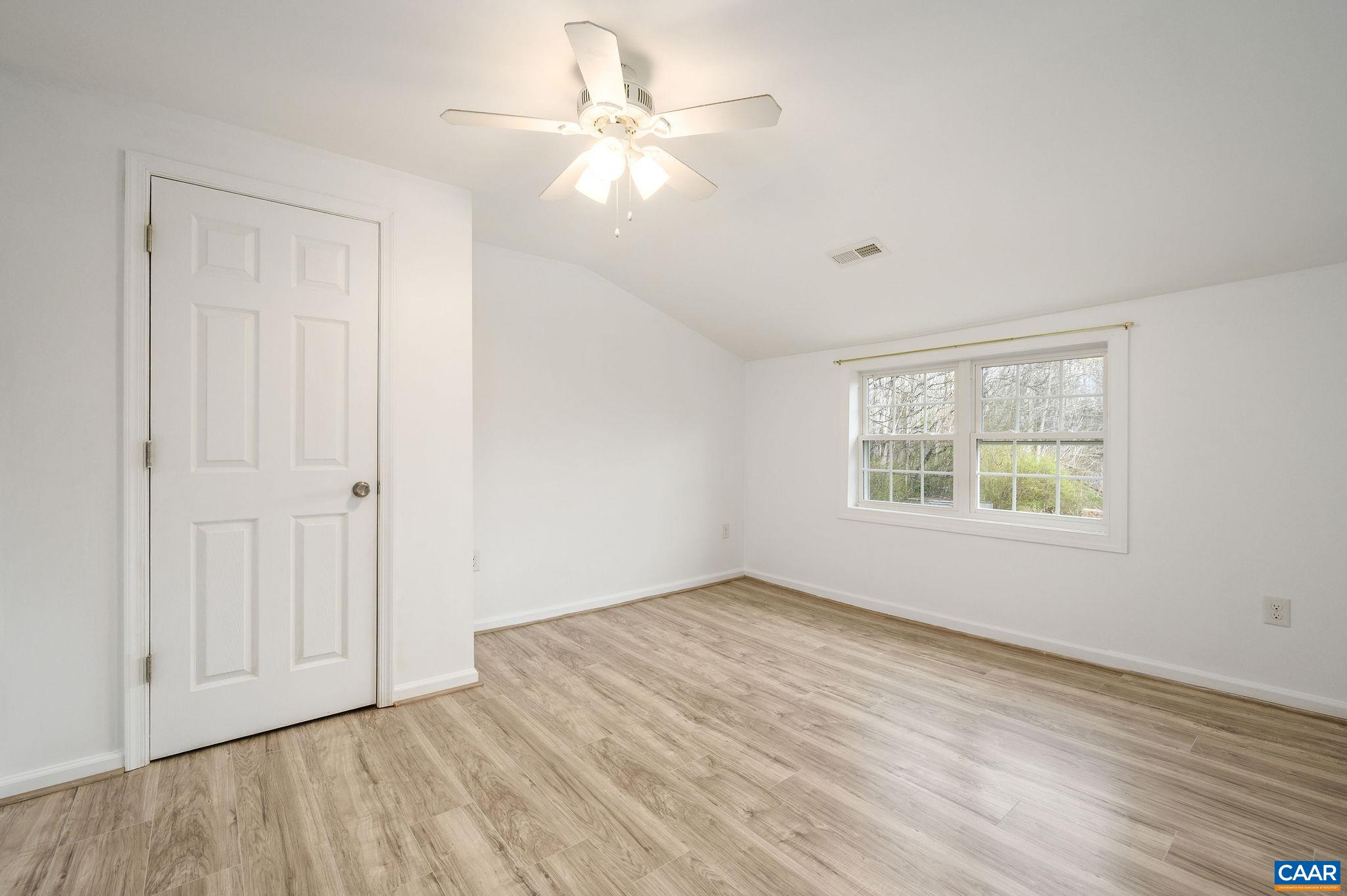 5029 Green Creek Road Schuyler, VA 22969 - Photo 15 of 27 wooden floor in an empty room with a window