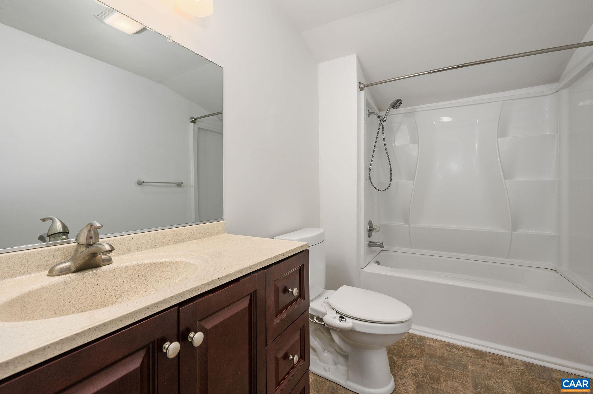 5029 Green Creek Road Schuyler, VA 22969 - Photo 17 of 27 a bathroom with a sink a toilet and a bathtub