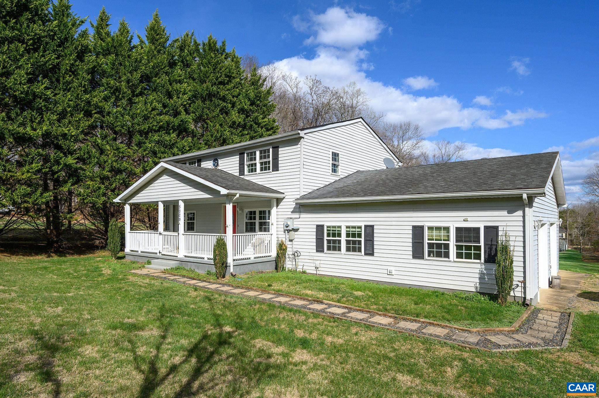 5029 Green Creek Road Schuyler, VA 22969 - Photo 19 of 27 a front view of a house with a yard