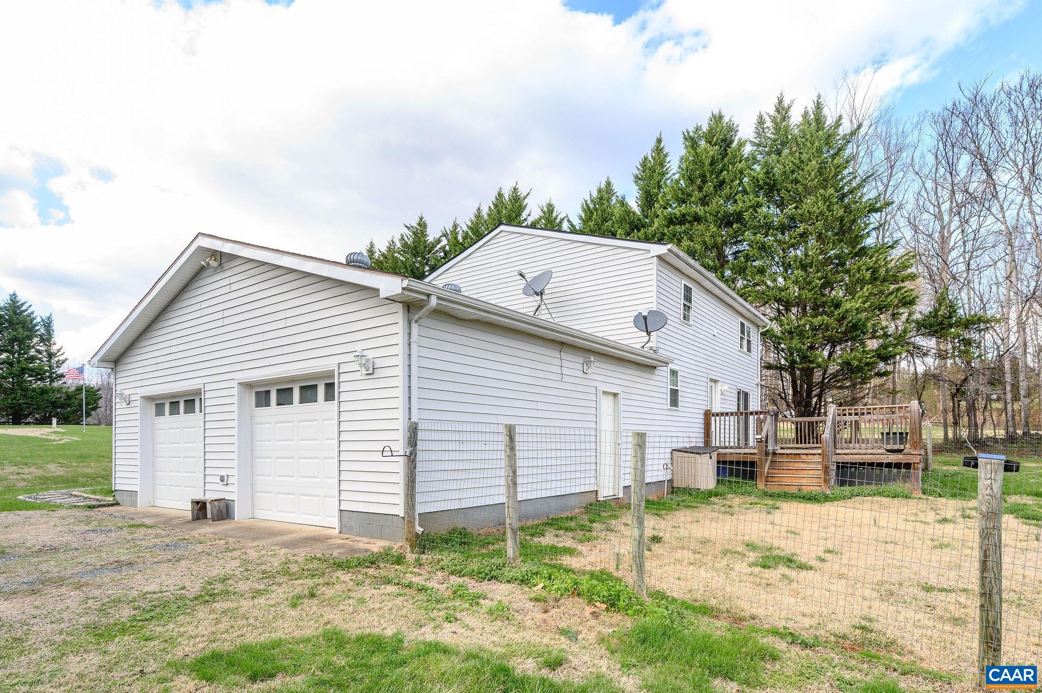 5029 Green Creek Road Schuyler, VA 22969 - Photo 20 of 27 a house that has a tree in front of the house