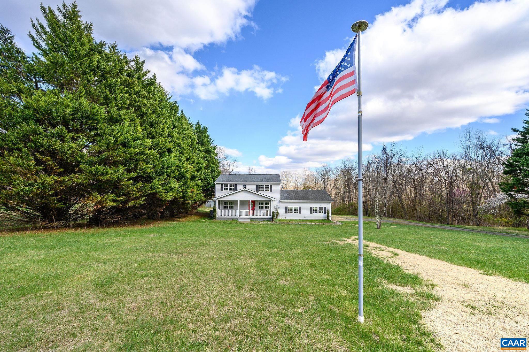 5029 Green Creek Road Schuyler, VA 22969 - Photo 27 of 27 a backyard of a house with table and chairs