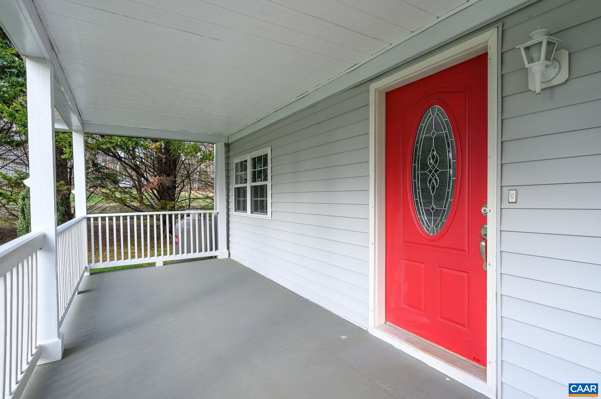 5029 Green Creek Road Schuyler, VA 22969 - Photo 3 of 27 a view of a red door and wooden floor