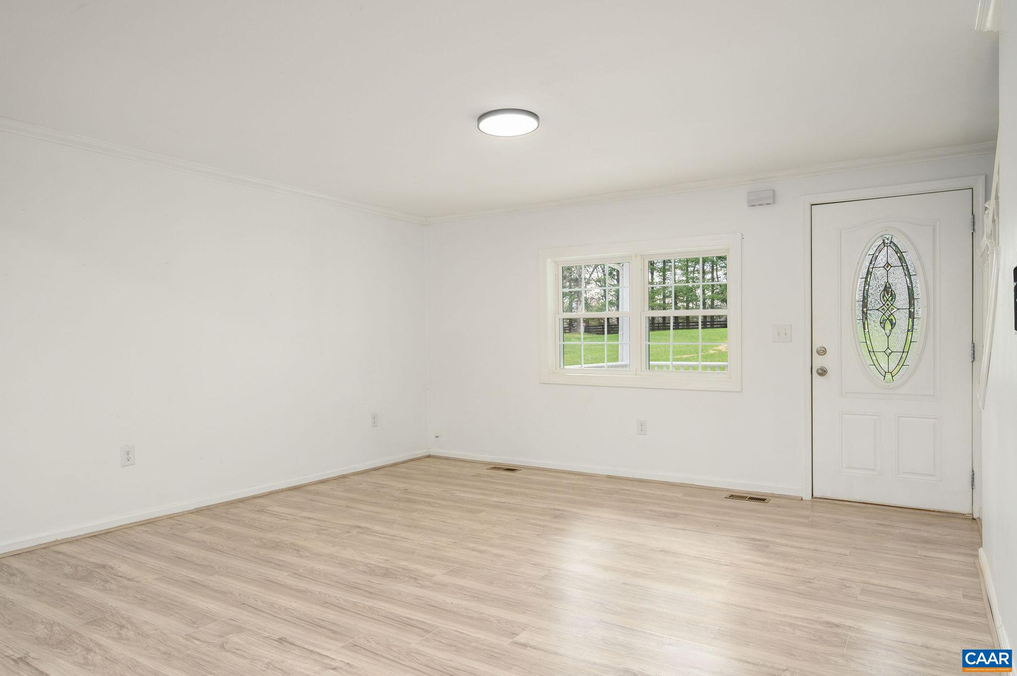 5029 Green Creek Road Schuyler, VA 22969 - Photo 4 of 27 wooden floor in a room next to a window