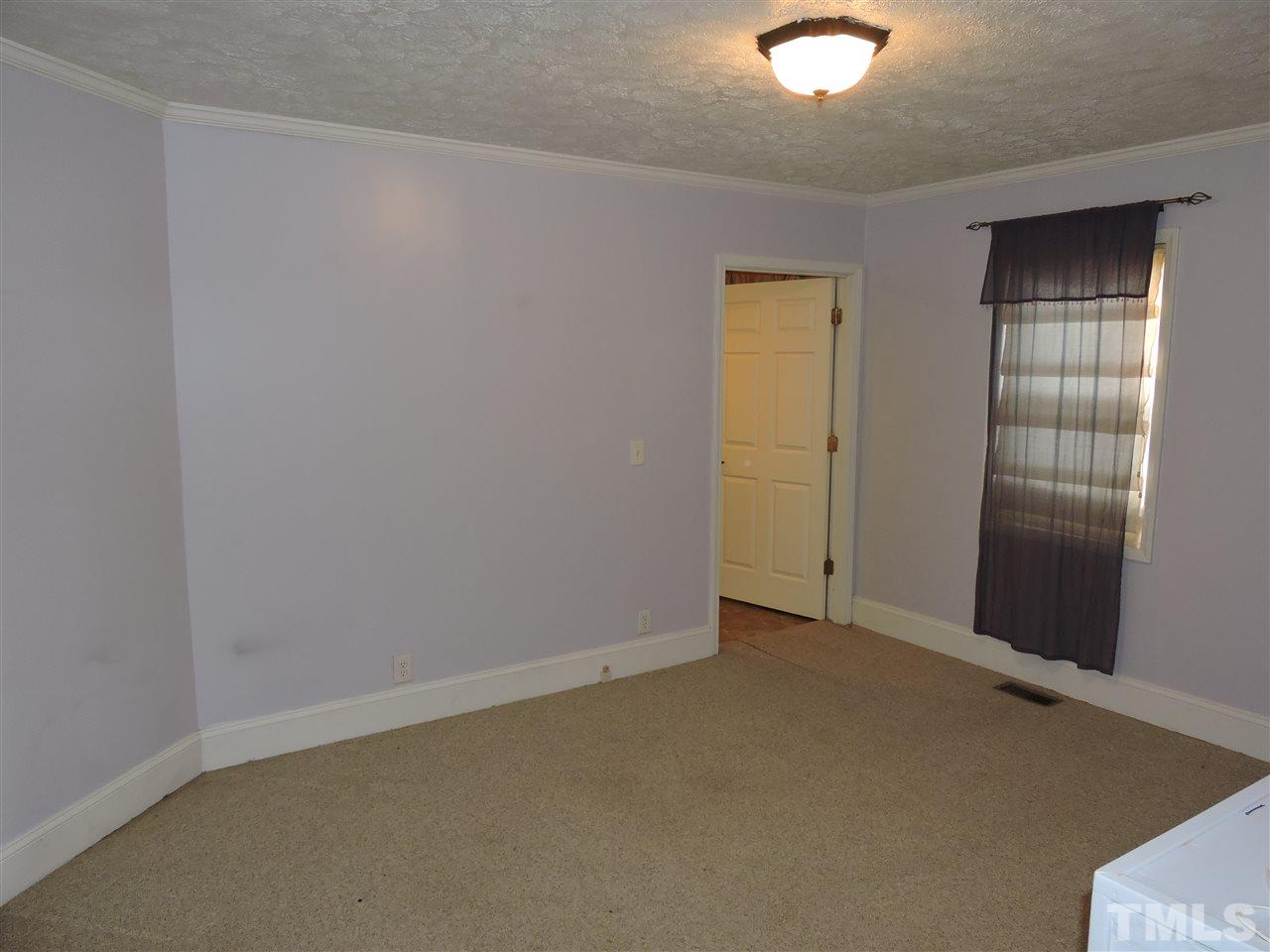 128 Allgood Street Roxboro, NC 27573 - Photo 15 of 17 an empty room with closet