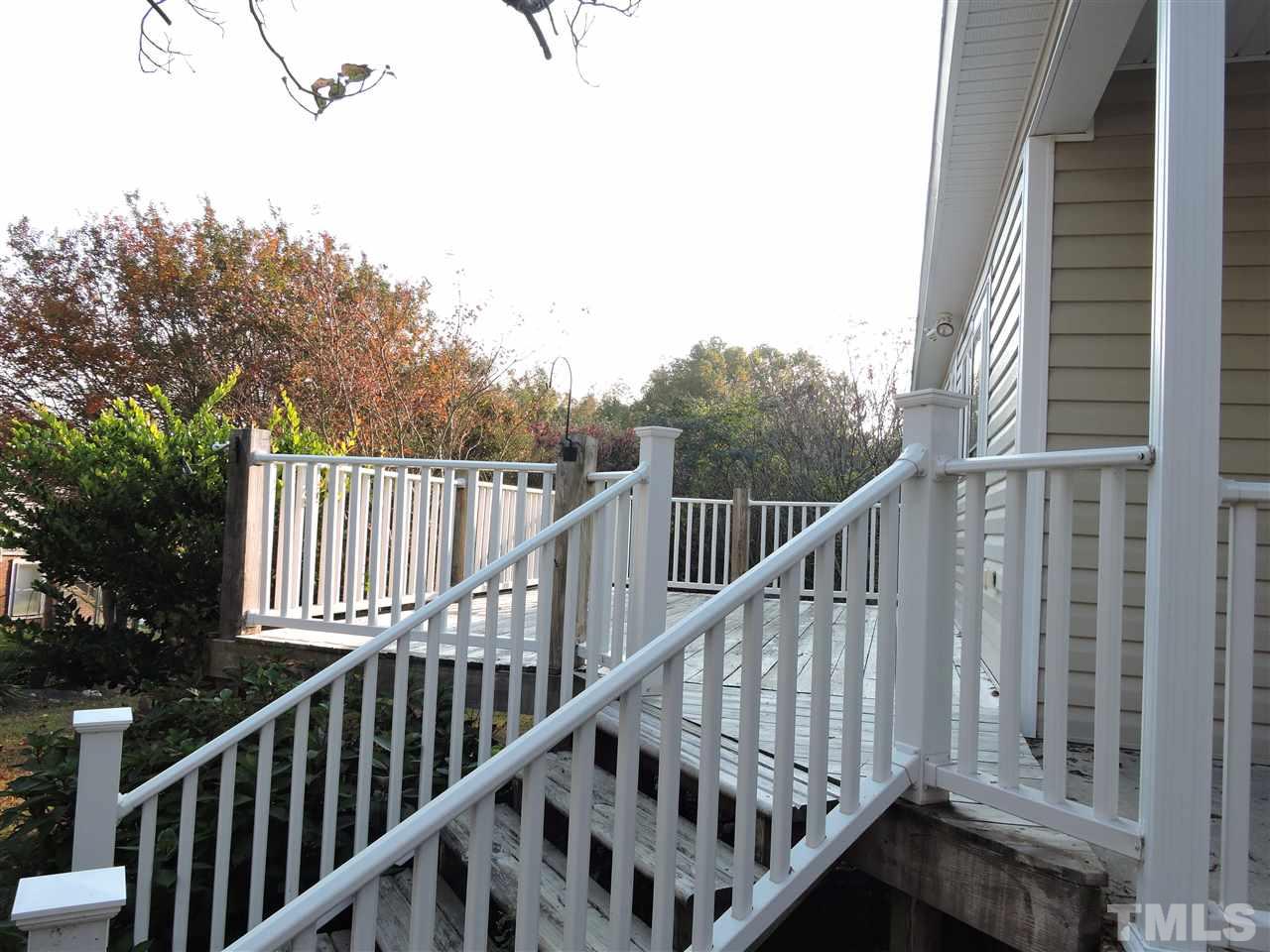 128 Allgood Street Roxboro, NC 27573 - Photo 17 of 17 a view of balcony with wooden floor and fence