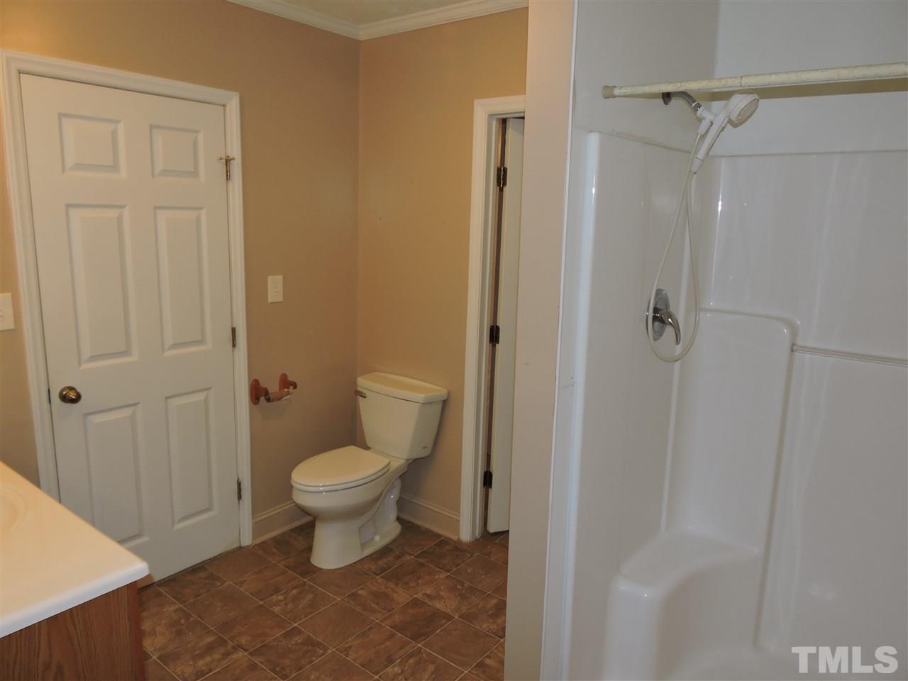 128 Allgood Street Roxboro, NC 27573 - Photo 6 of 17 a bathroom with a toilet