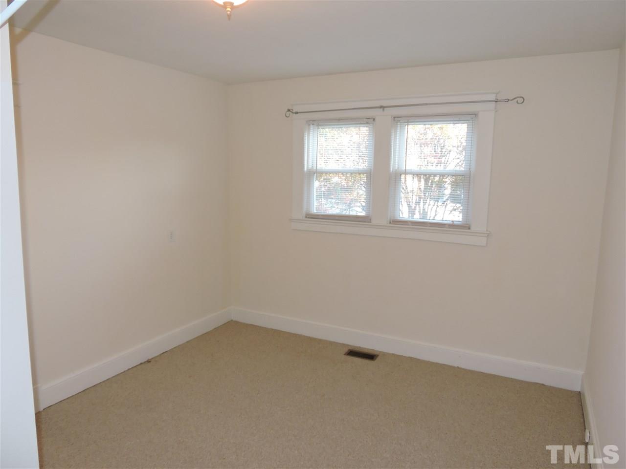 128 Allgood Street Roxboro, NC 27573 - Photo 9 of 17 an empty room with a window
