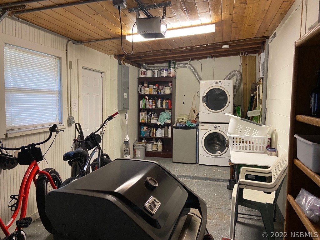 229 Robinson Road New Smyrna Beach, FL 32169 - Photo 20 of 23 a room with furniture and a flat screen tv