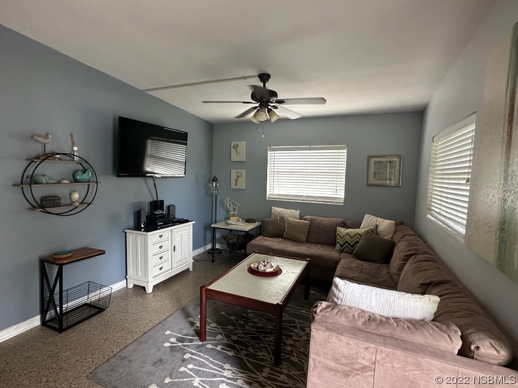 229 Robinson Road New Smyrna Beach, FL 32169 - Photo 10 of 23 a living room with furniture and a window