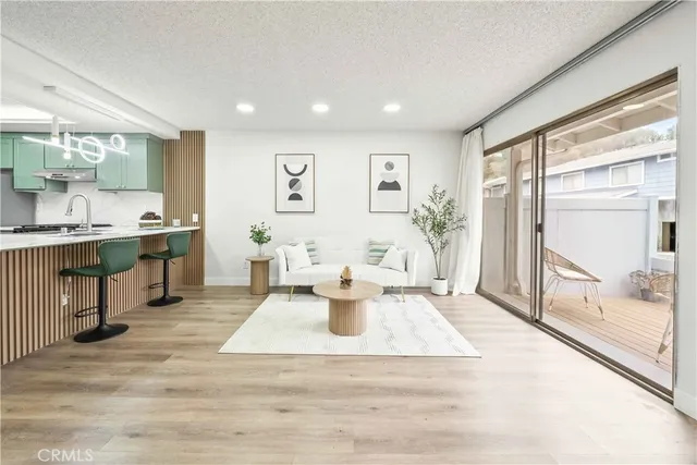 a view of a living room and dining room