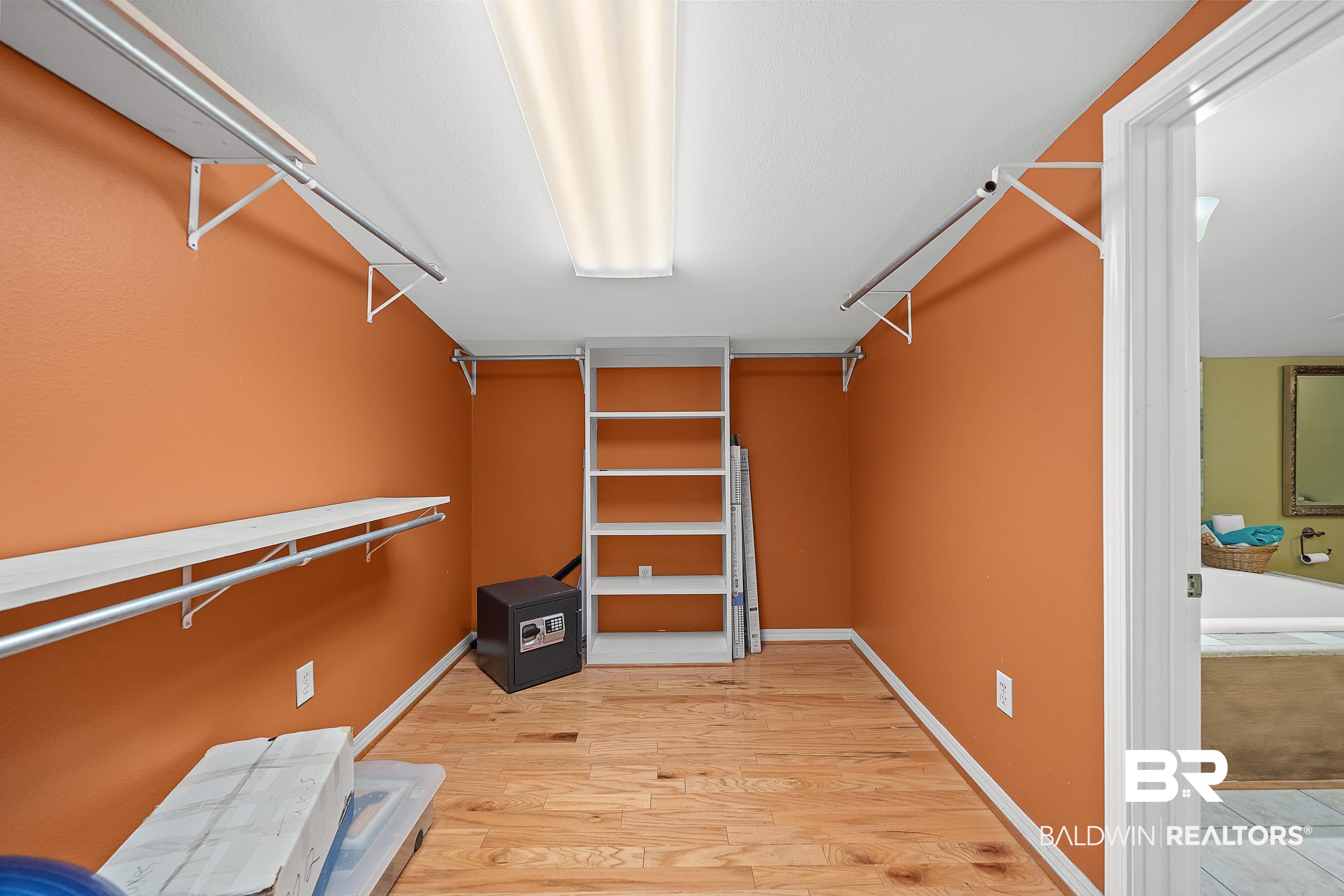11528 Whitehouse Fork Road Bay Minette, AL 36507 - Photo 18 of 37 Walk in closet with light wood-type flooring
