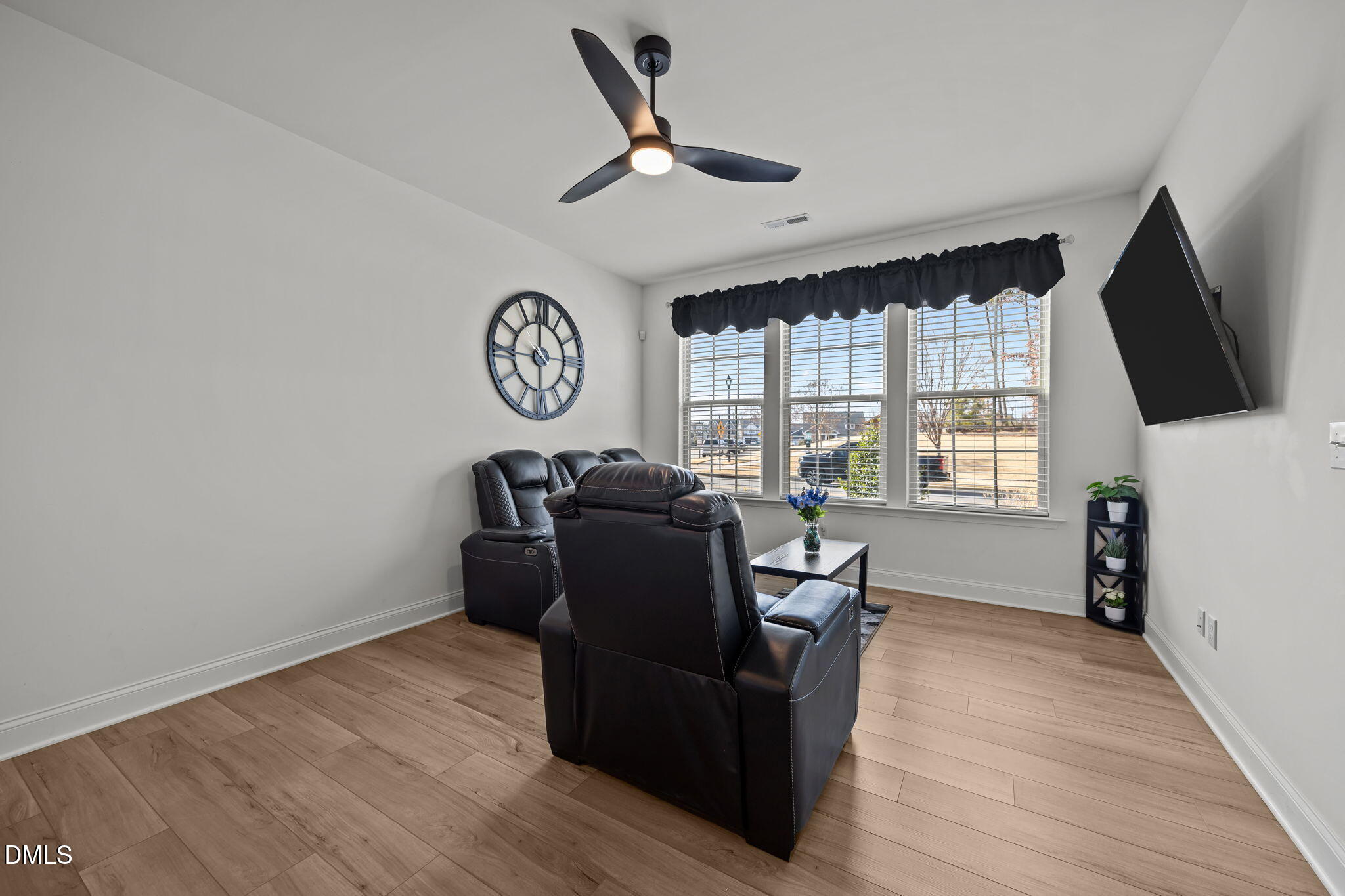 6173 Taylor Road Wendell, NC 27591 - Photo 7 of 31 a living room with furniture and a window