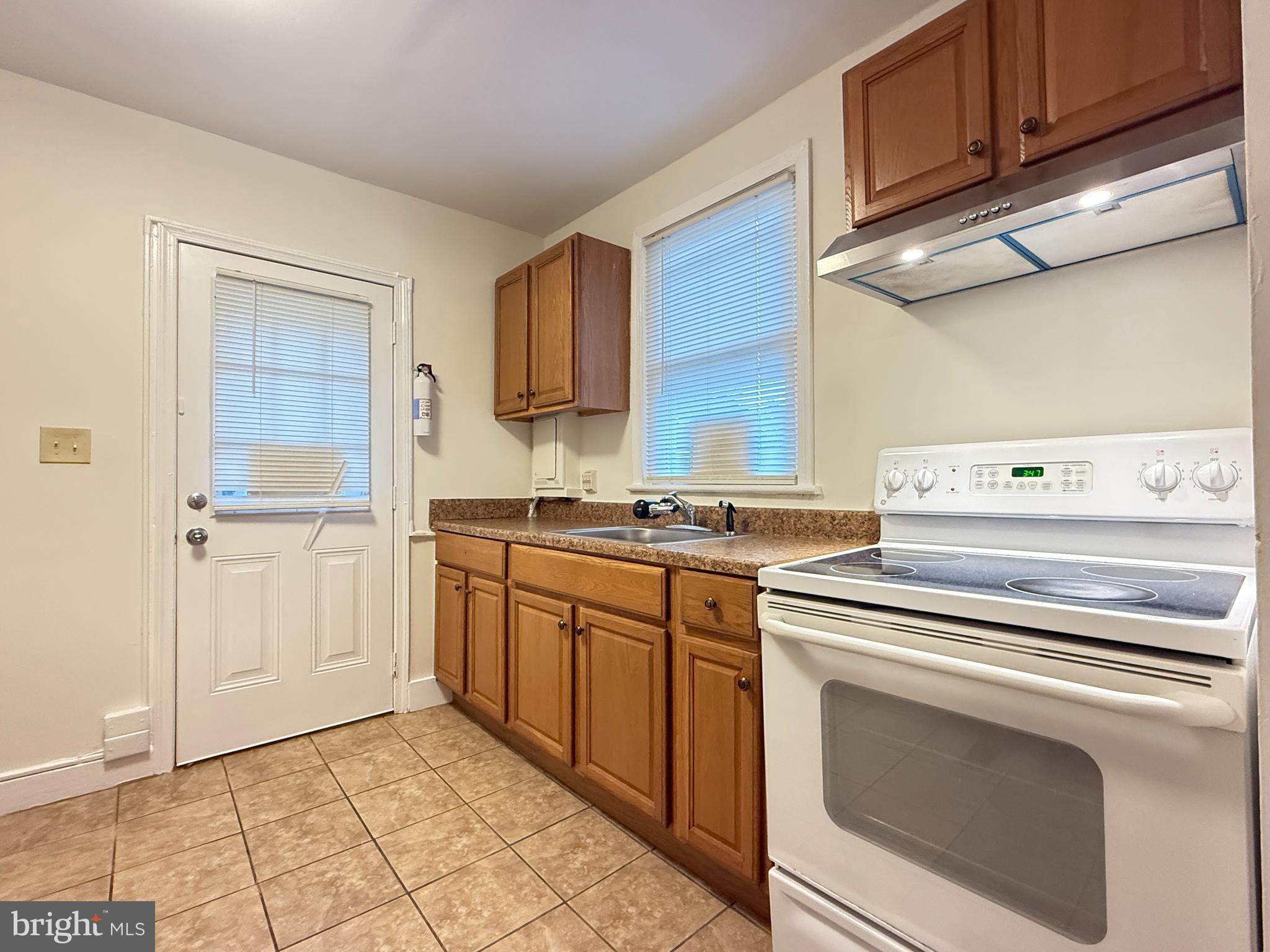 13701 Old Indian Head Road Brandywine, MD 20613 - Photo 11 of 18 a utility room with washer and dryer