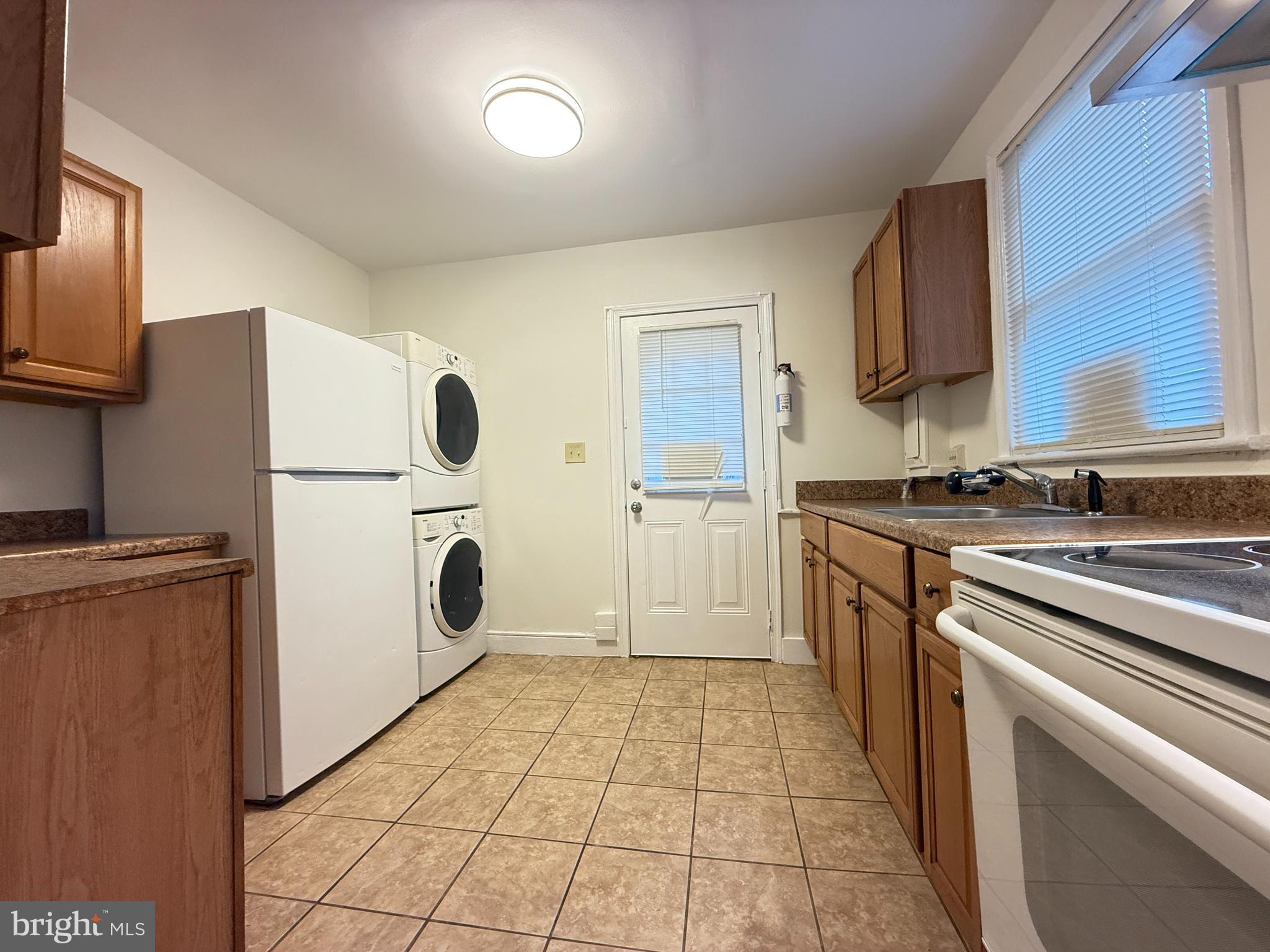 13701 Old Indian Head Road Brandywine, MD 20613 - Photo 12 of 18 a kitchen with stainless steel appliances a refrigerator sink and stove