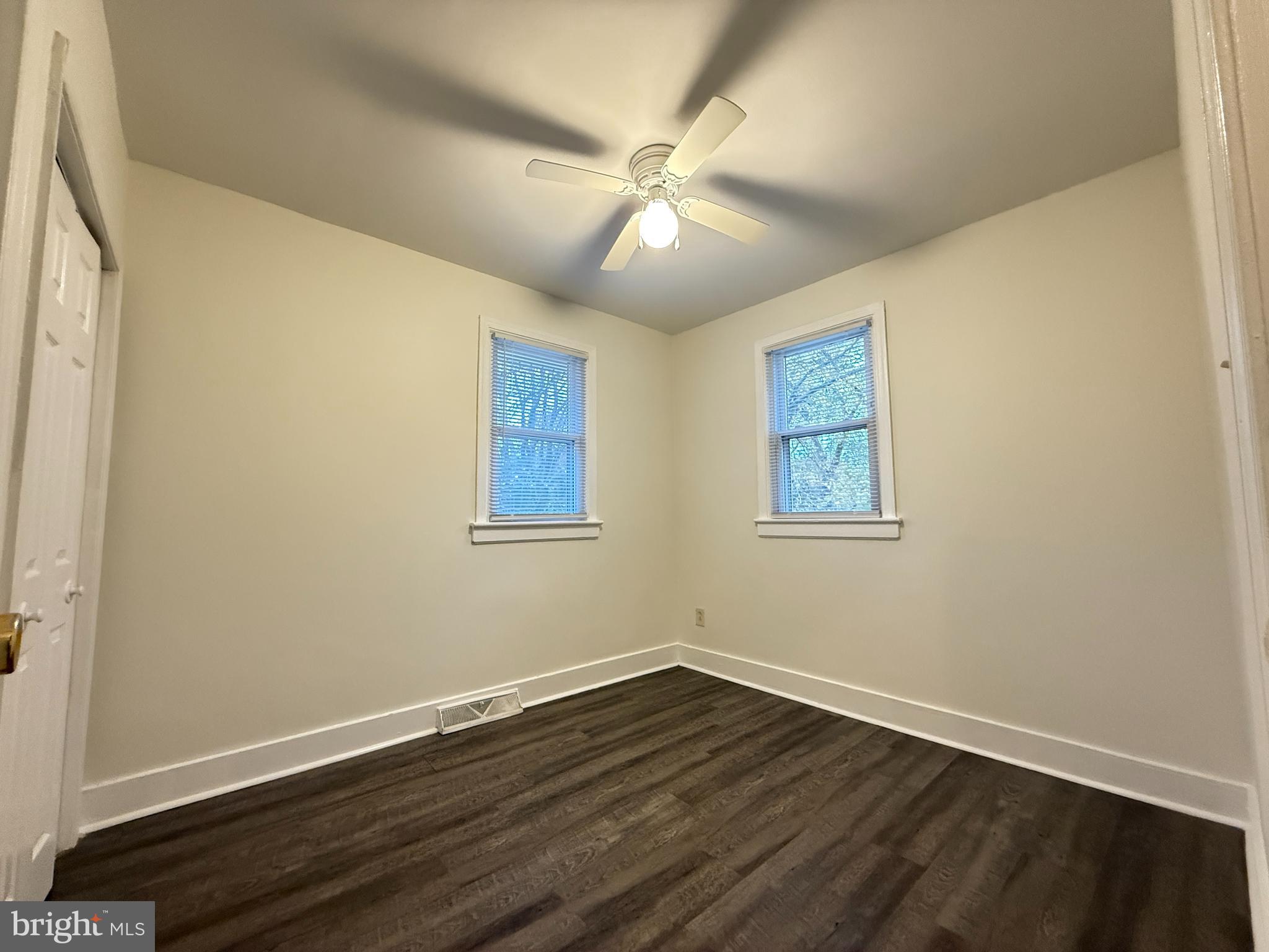 13701 Old Indian Head Road Brandywine, MD 20613 - Photo 15 of 18 a view of an empty room with wooden floor and a window