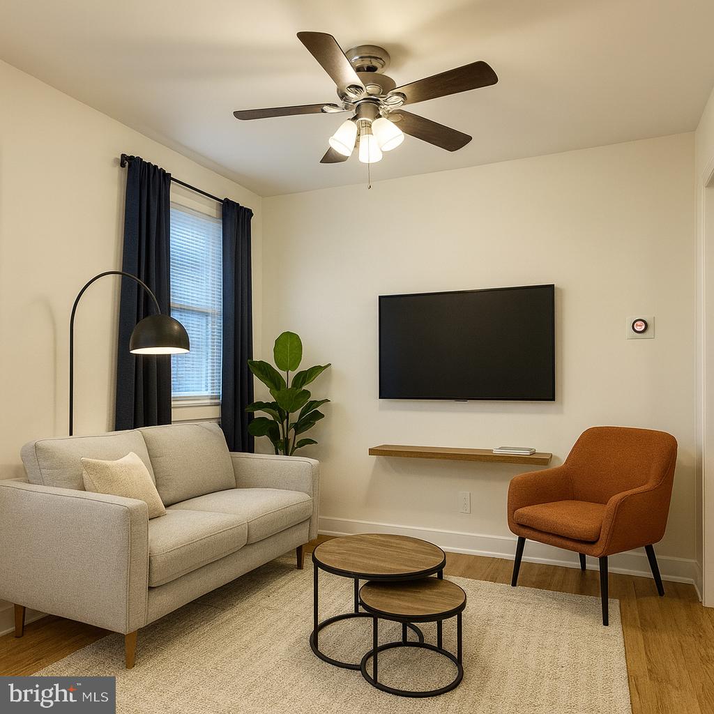 13701 Old Indian Head Road Brandywine, MD 20613 - Photo 2 of 18 a living room with furniture and a flat screen tv
