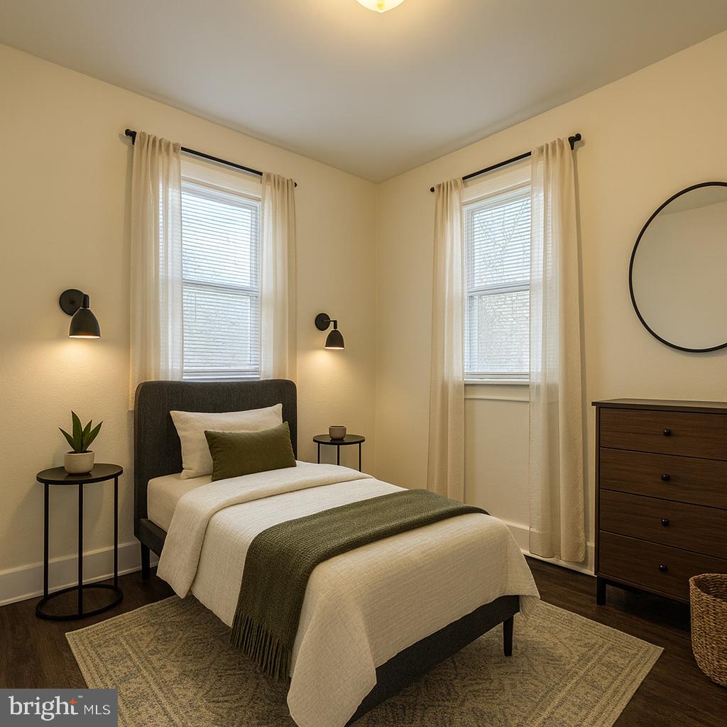 13701 Old Indian Head Road Brandywine, MD 20613 - Photo 7 of 18 a bedroom with a bed and wooden floor