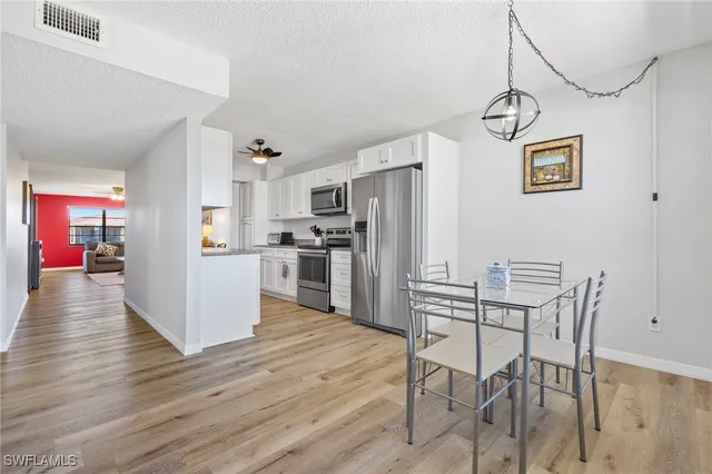 a view of kitchen and windows