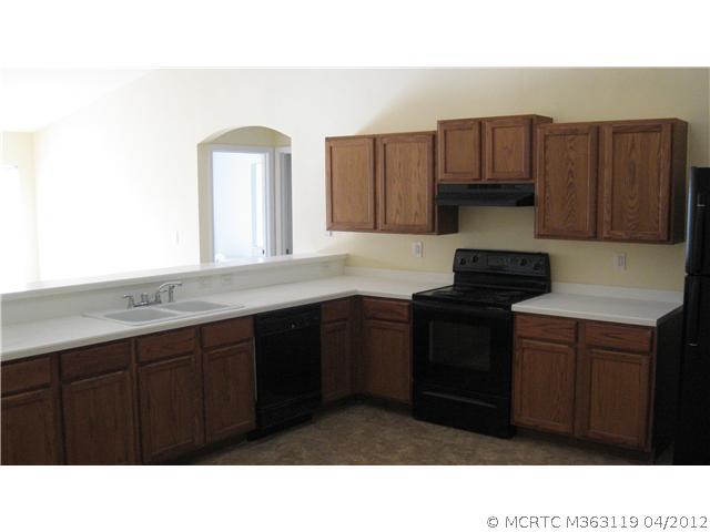 1725 Southwest Palermo Road Port St. Lucie, FL 34987 - Photo 3 of 12 Kitchen.