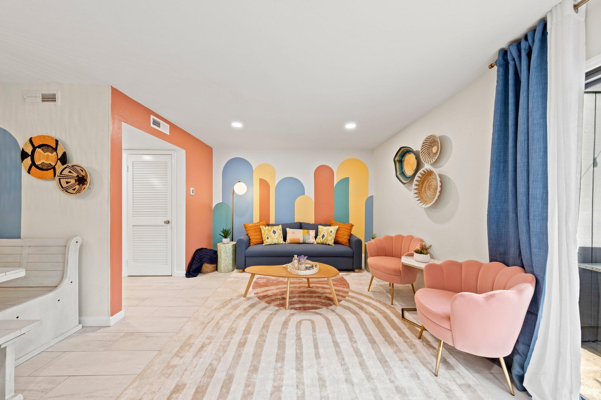 940 Highway 98, Unit 36 Destin, FL 32541 - Photo 2 of 31 a bedroom with a bed and a couch