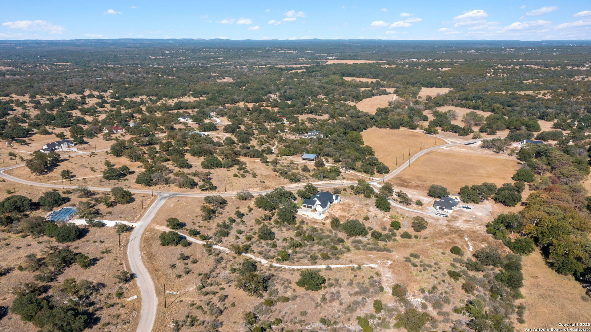 Lot 69 Sabinas Springs Road Boerne, TX 78006 - Photo 41 of 54 an aerial view of residential building with parking space