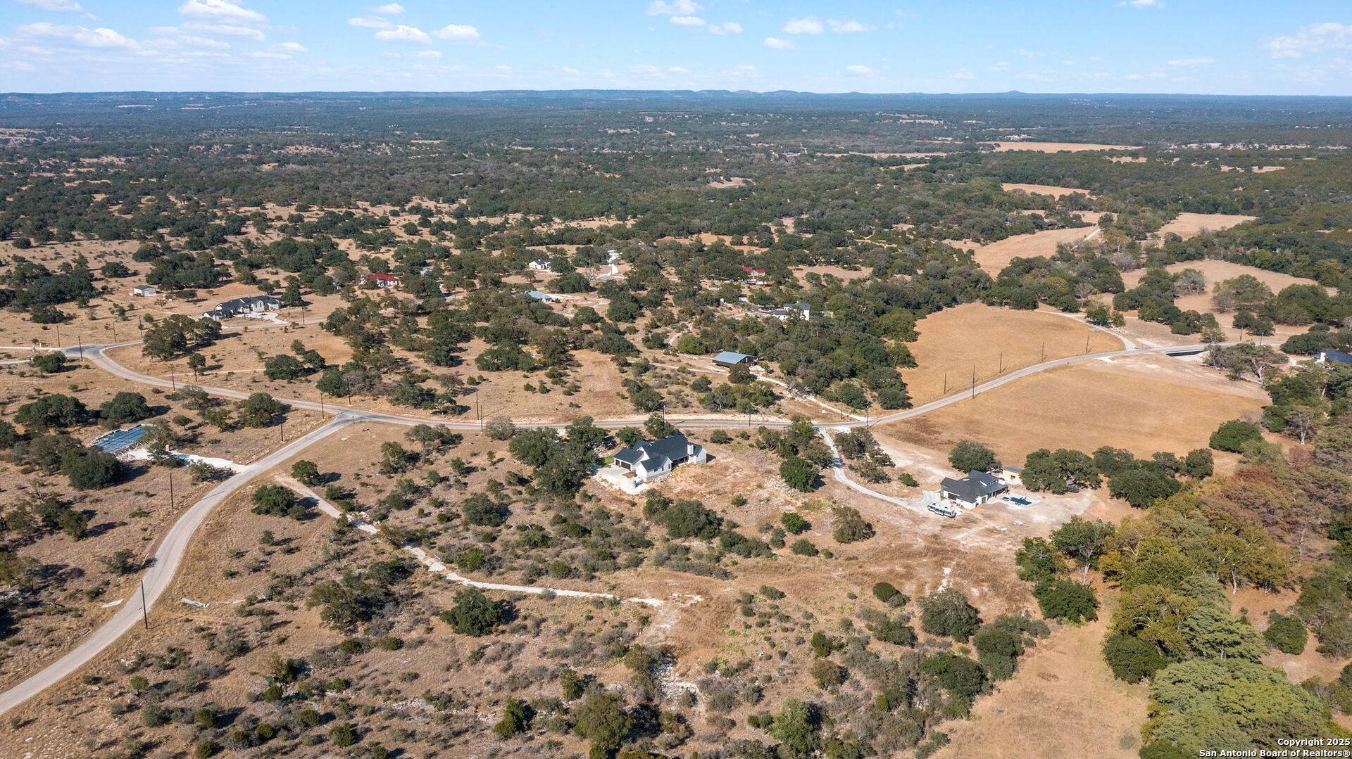 Lot 69 Sabinas Springs Road Boerne, TX 78006 - Photo 42 of 54 an aerial view of residential building with parking space