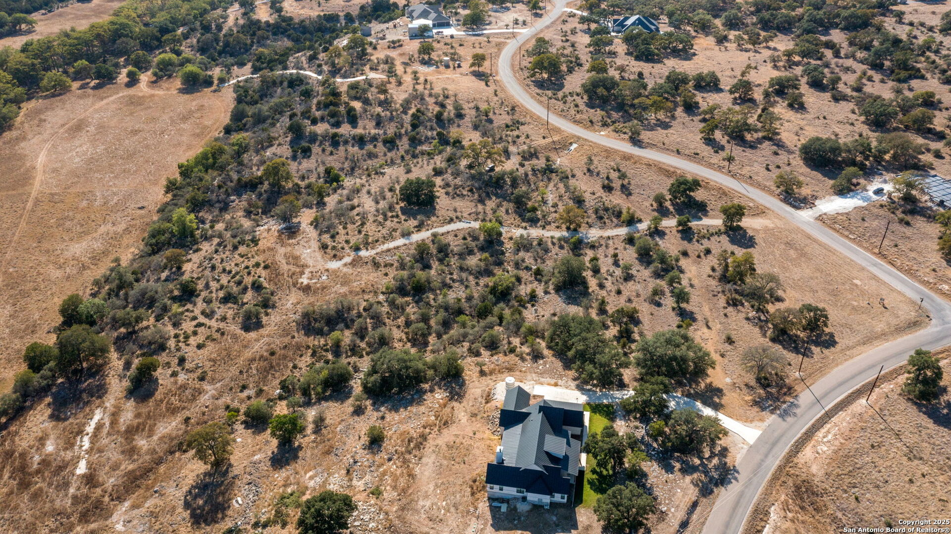 Lot 69 Sabinas Springs Road Boerne, TX 78006 - Photo 48 of 54 an aerial view of house with yard