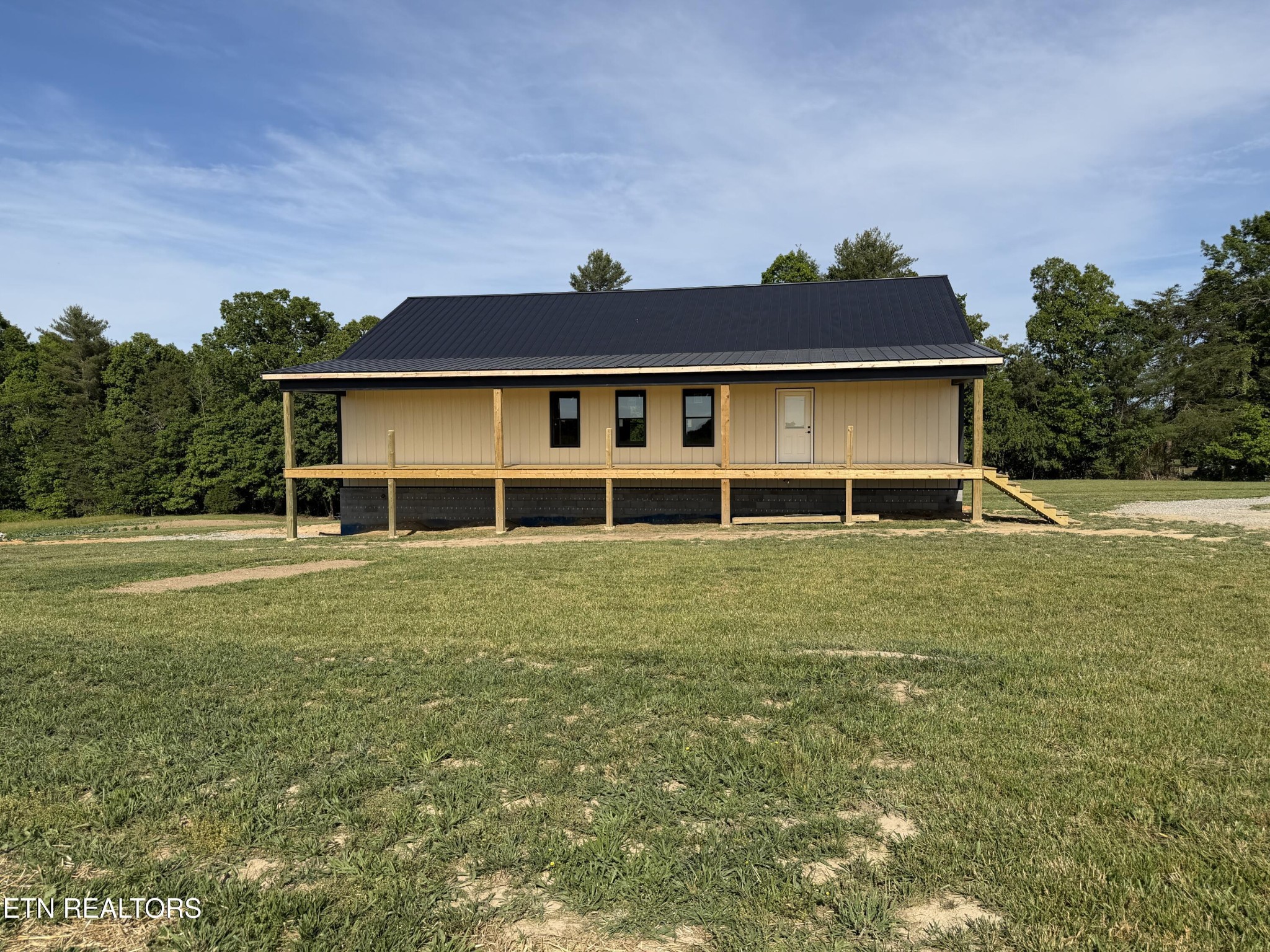 110 Don Conatser Road Allardt, TN 38504 - Photo 13 of 38 a front view of a house with a yard