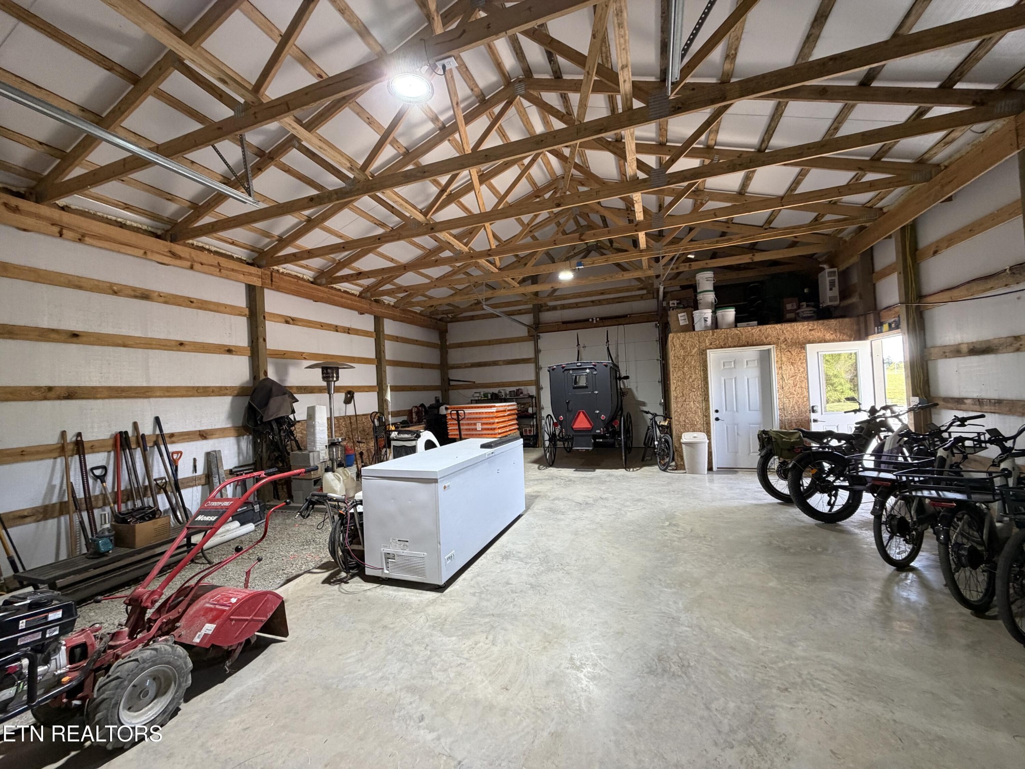 110 Don Conatser Road Allardt, TN 38504 - Photo 23 of 38 a view of a garage with lots of stuff and furniture