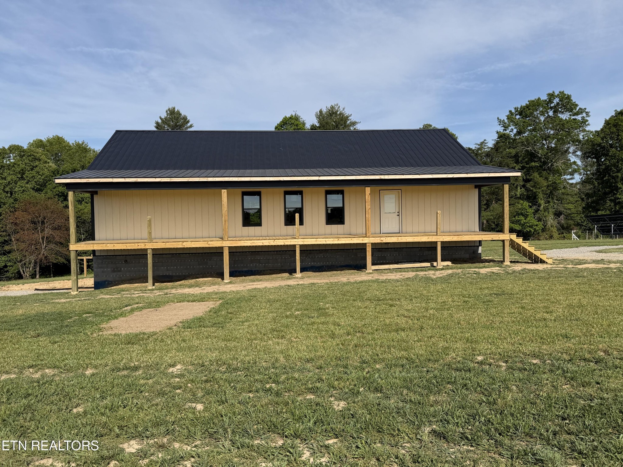 110 Don Conatser Road Allardt, TN 38504 - Photo 5 of 38 a front view of a house with a yard