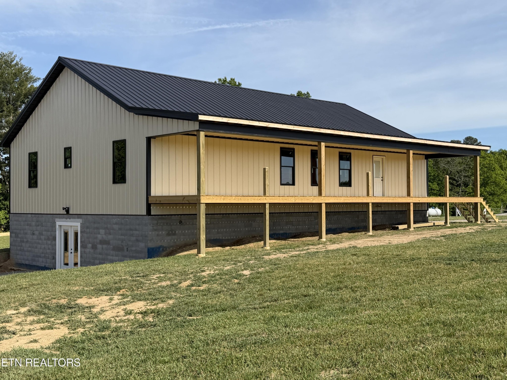 110 Don Conatser Road Allardt, TN 38504 - Photo 6 of 38 a view of a house with a backyard