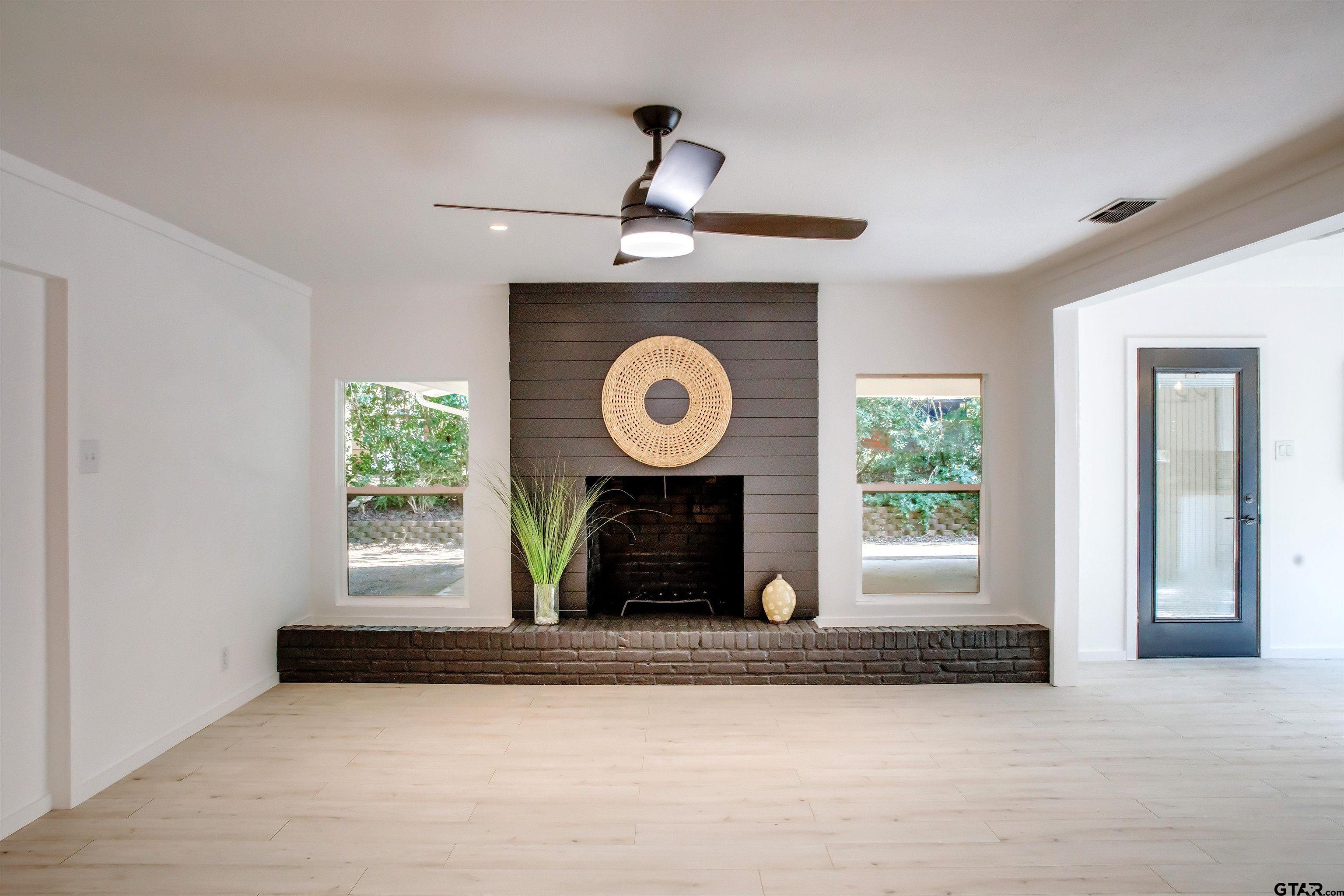 439 Lone Star Lane Hideaway, TX 75771 - Photo 12 of 36 a front view of a house with garden