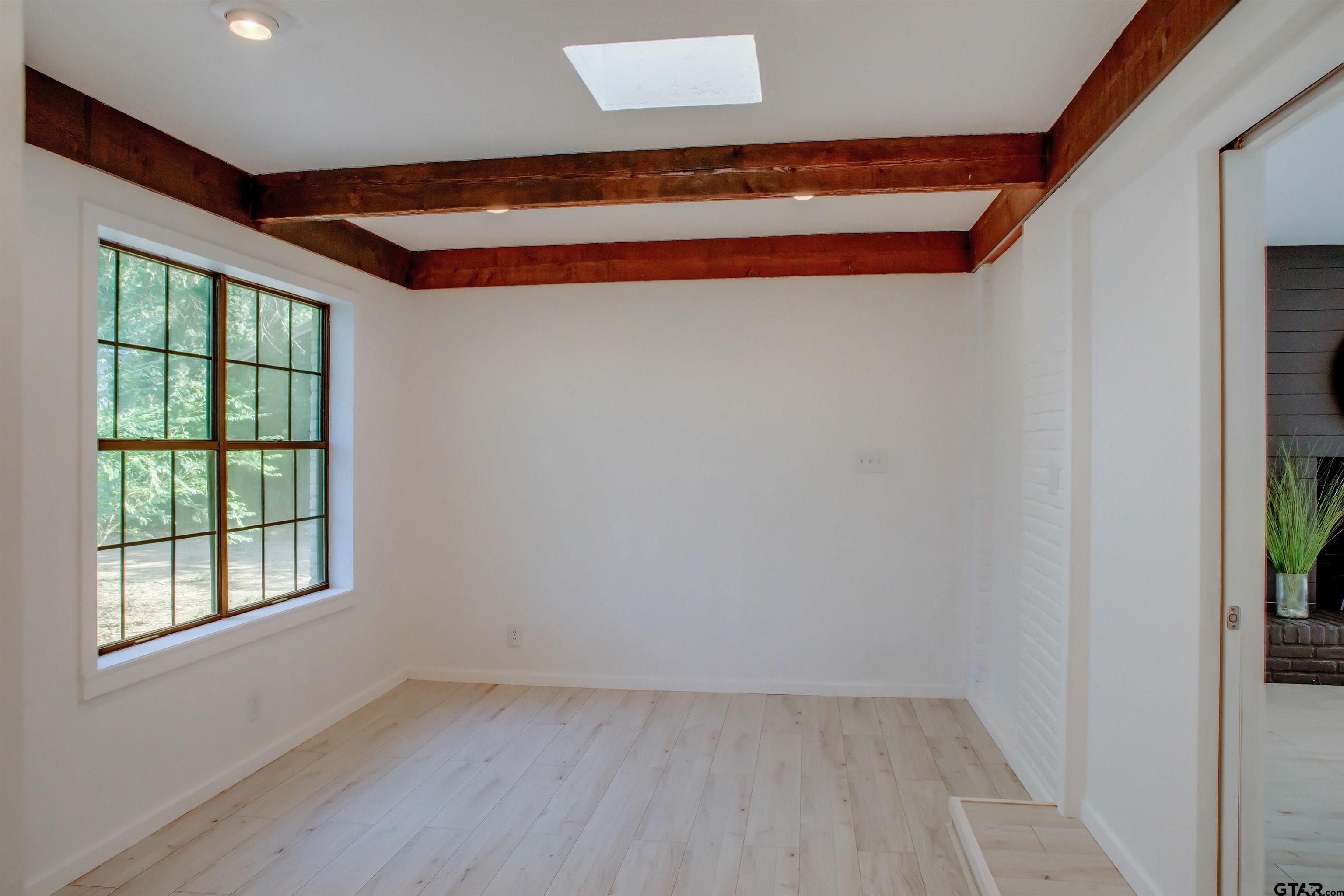 439 Lone Star Lane Hideaway, TX 75771 - Photo 22 of 36 an empty room with windows