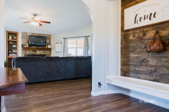 308 North Nolan Street Ridgecrest, CA 93555 - Photo 5 of 35 a view of kitchen with furniture and flat screen tv