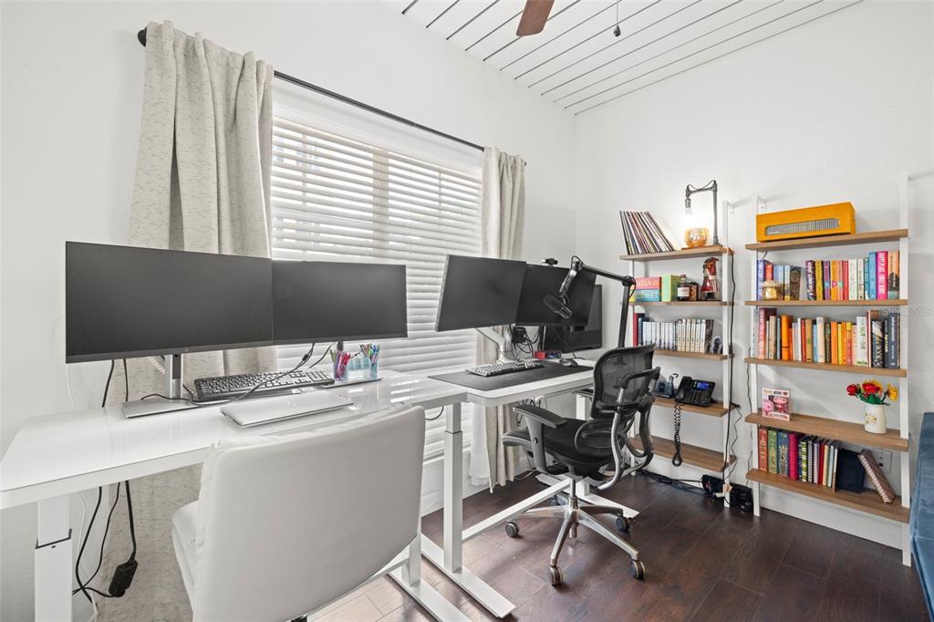 2410 West Azeele Street, Unit 214 Tampa, FL 33609 - Photo 12 of 24 a view of a workspace with furniture and a window