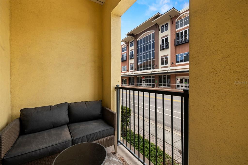 2410 West Azeele Street, Unit 214 Tampa, FL 33609 - Photo 19 of 24 a balcony view with a couch